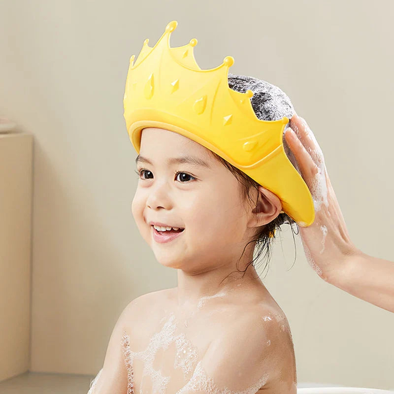 Bonnet bébé réglable pour protection du bain et de la douche