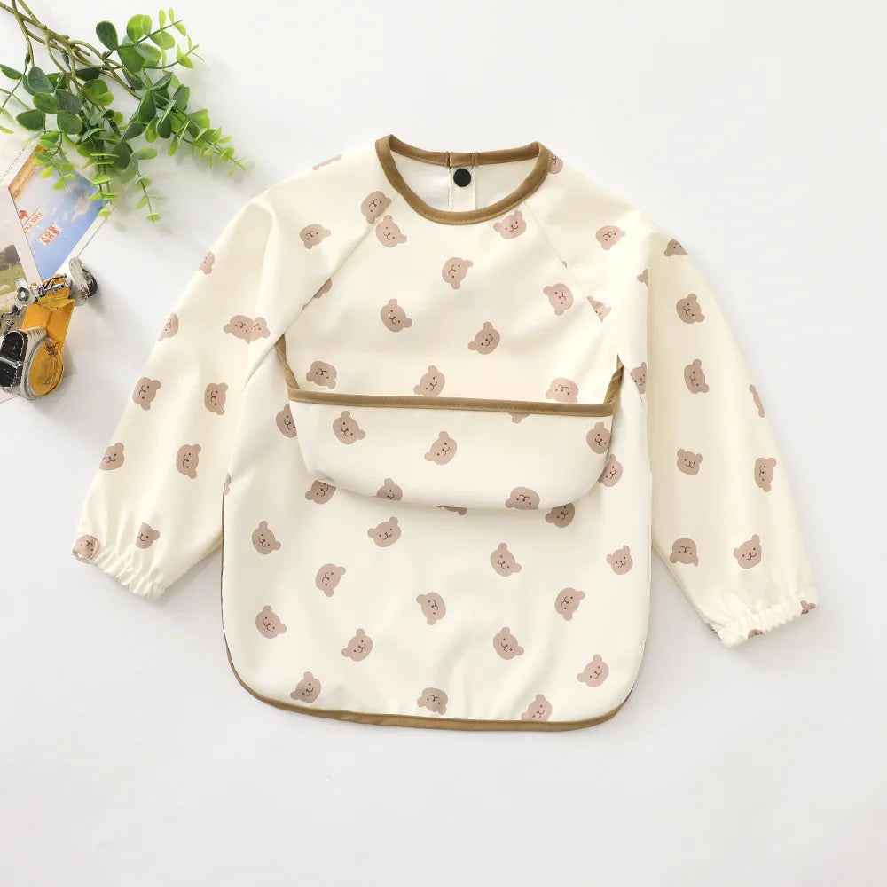 Bavoir bébé imperméable à manches longues et poche