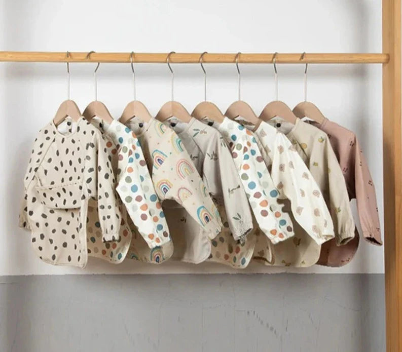 Bavoir bébé imperméable à manches longues et poche