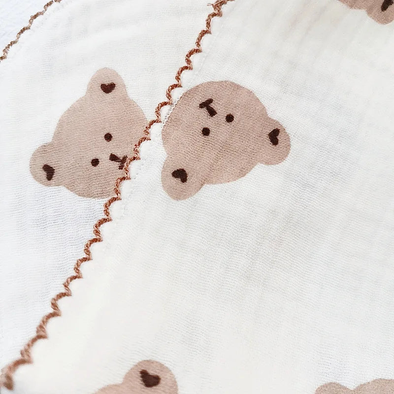 Serviette bébé en coton doux et bavoir en mousseline