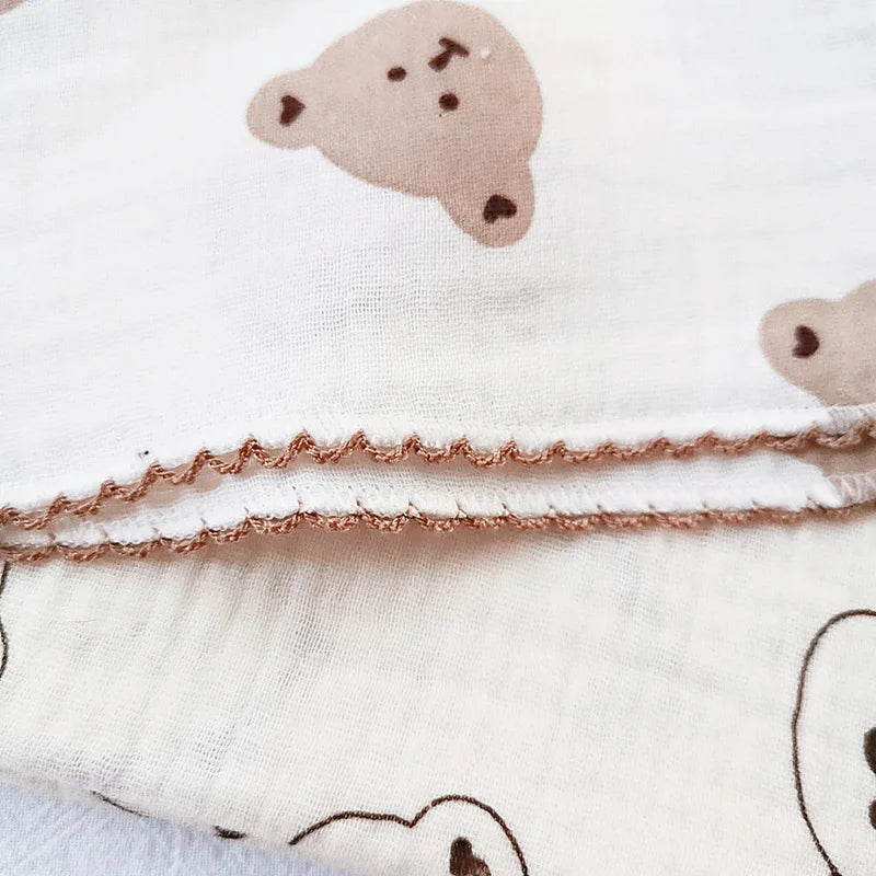 Serviette bébé en coton doux et bavoir en mousseline