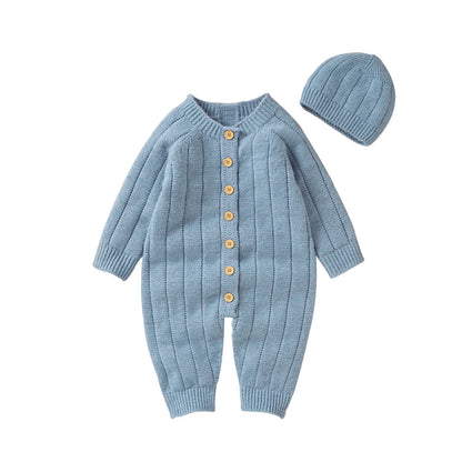 Warme gebreide babyromper en mutsset