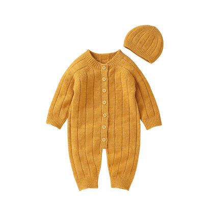 Warme gebreide babyromper en mutsset